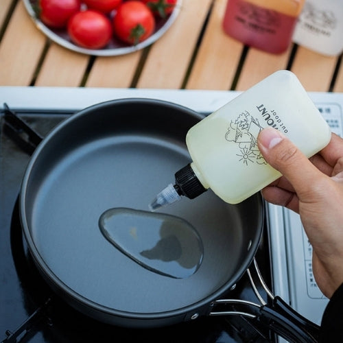 Bouteille distributrice d'huile